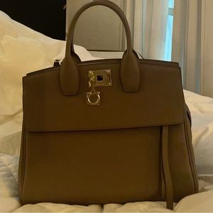 Salvatore Feragamos Top Handle Sachel Bag.